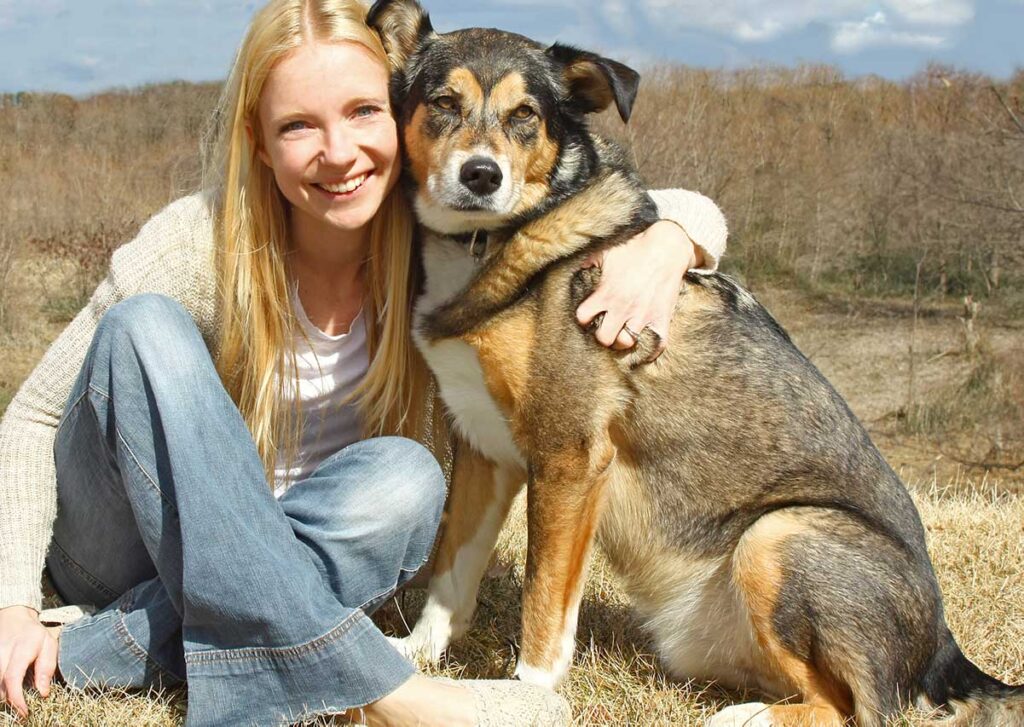 dog and owner active on a hike